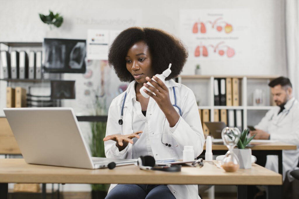 Qualified doctor making online consultation for patient